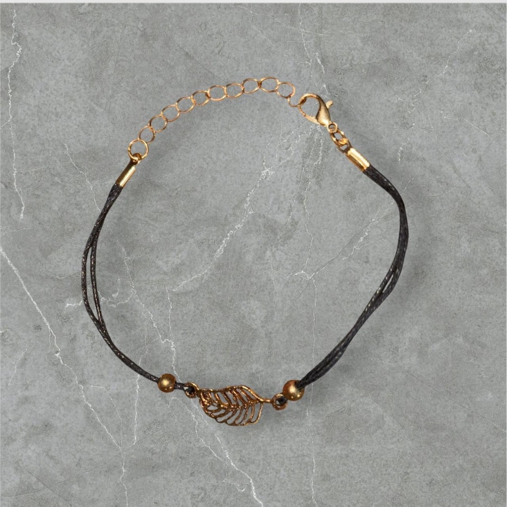 Elegant Gold and Black Bracelet